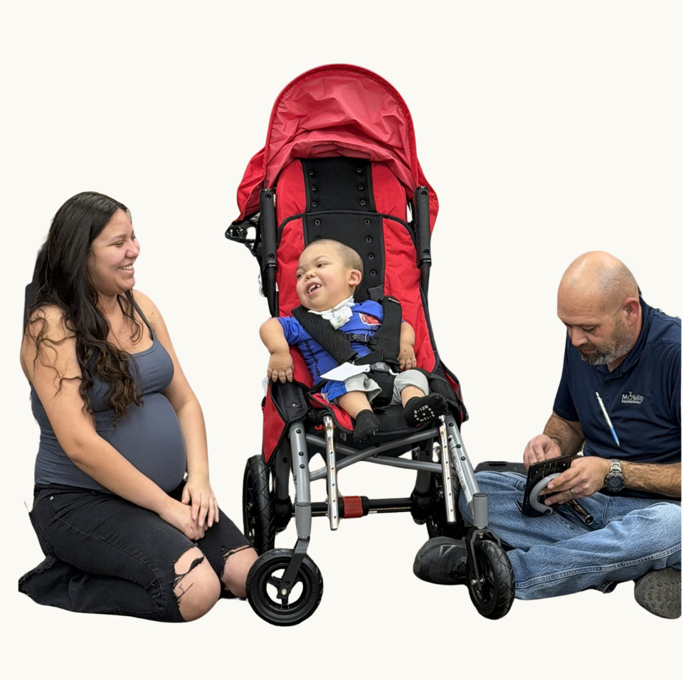 adaptive-mobility-equipment.png Child receiving a specialized stroller through Variety of the Desert's Freedom Program.