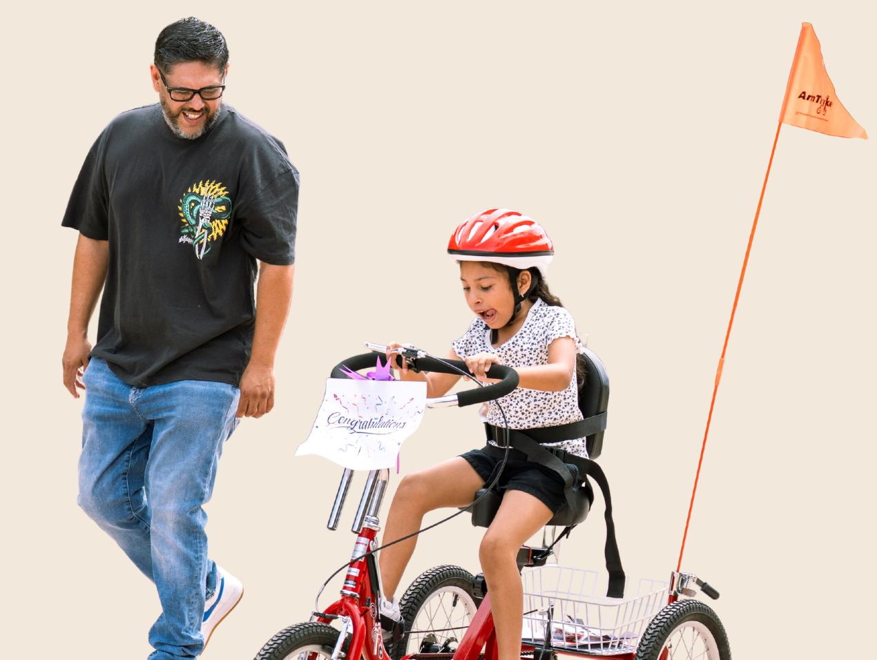 zoey-adaptive-bike.png Child riding an adaptive bicycle provided through Variety of the Desert's Freedom Program.